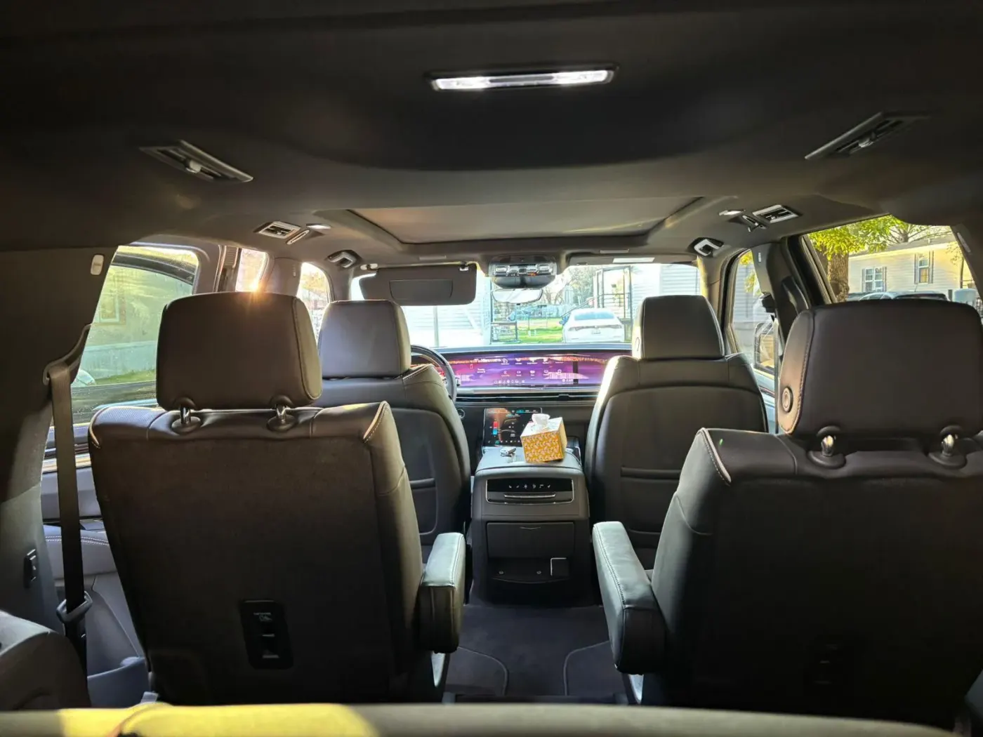 Cadillac Escalade front cabin and dashboard viewed from the rear