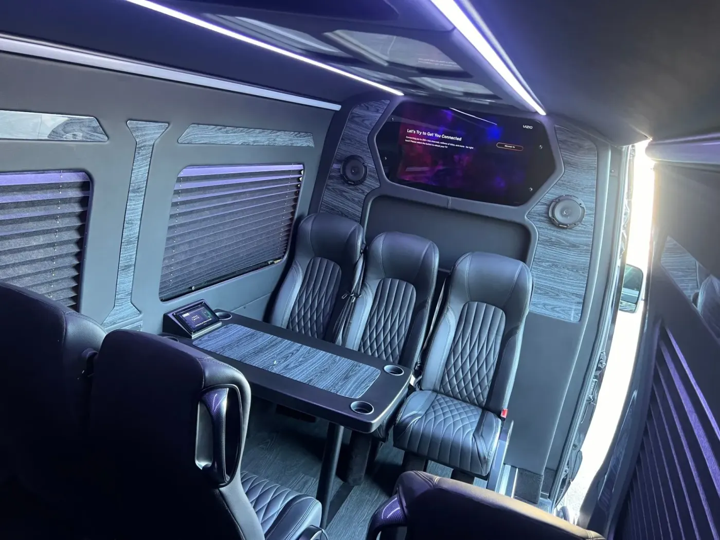Executive Sprinter rear passenger cabin prepared for group travel