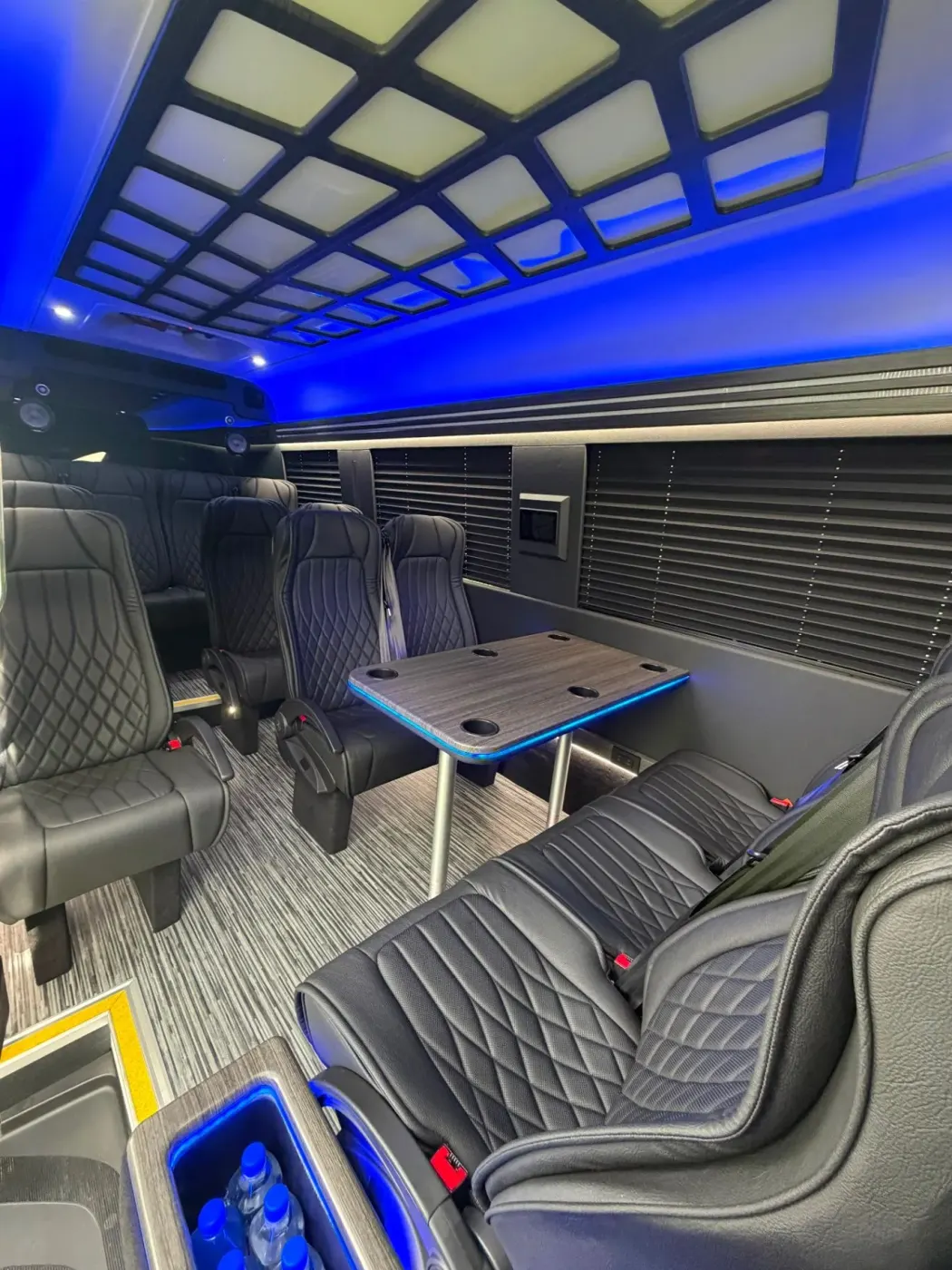 Executive Sprinter illuminated rear passenger cabin with executive seating