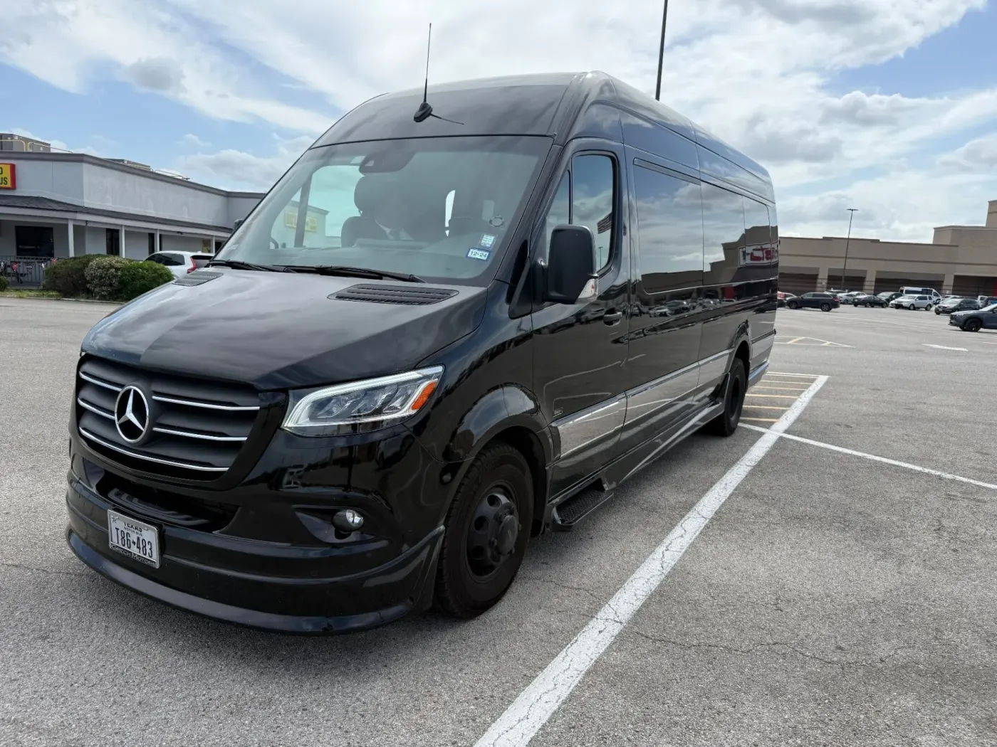 Nick Sadiku’s black Executive Sprinter shown from the front three-quarter view