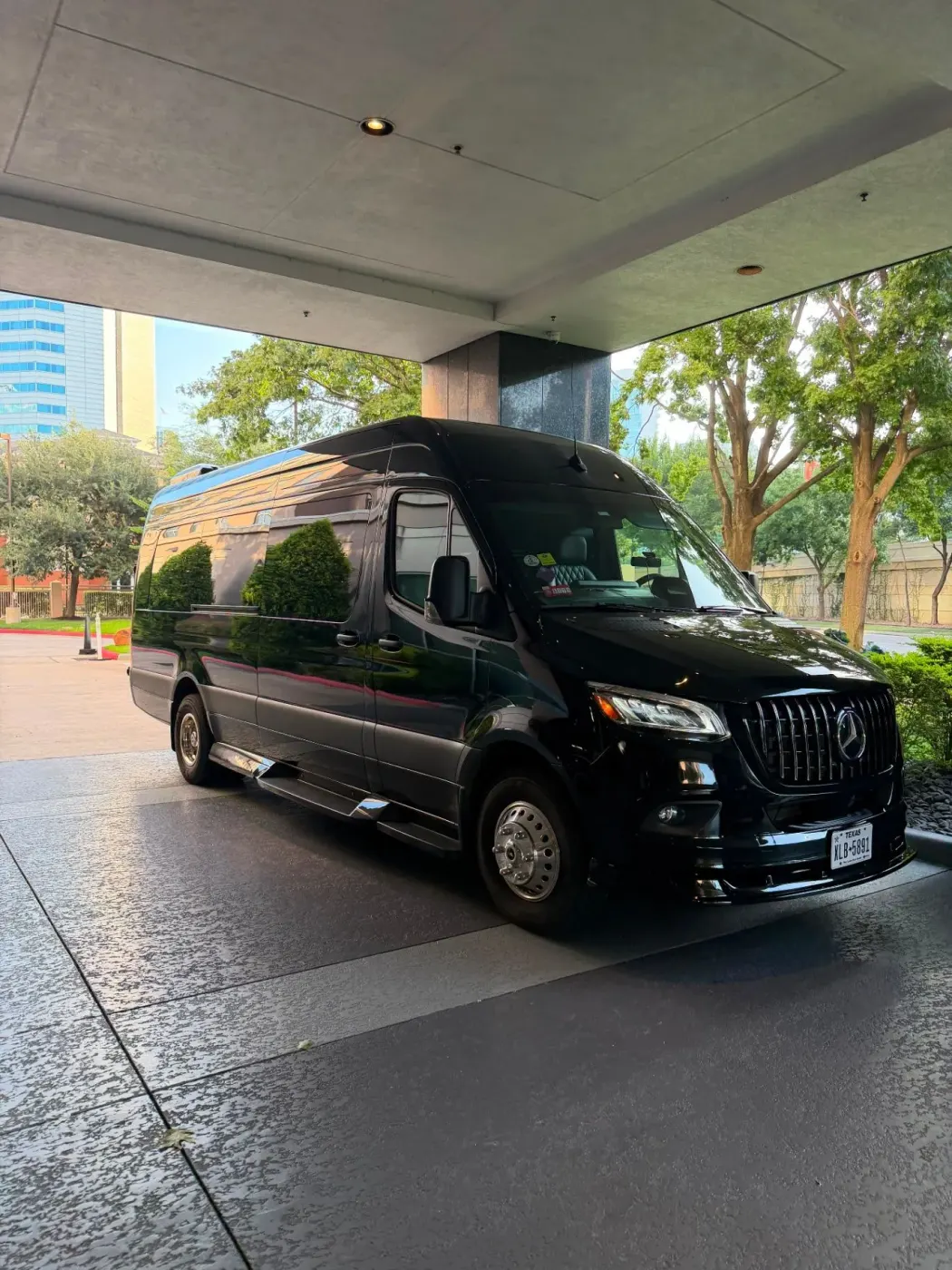 Nick Sadiku’s black Executive Sprinter shown from the exterior side and front quarter