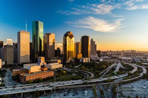 Downtown Houston skyline and highway interchange viewed from above